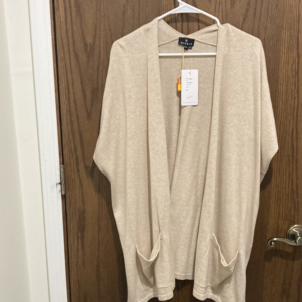 Brand new woman’s shirt sleeve oversized cardigan